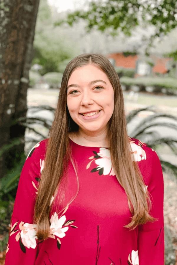 Kristina Lutz woman in red shirt with brown hair