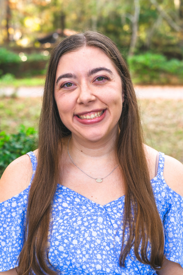 Kristina Lutz woman in blue shirt with brown hair